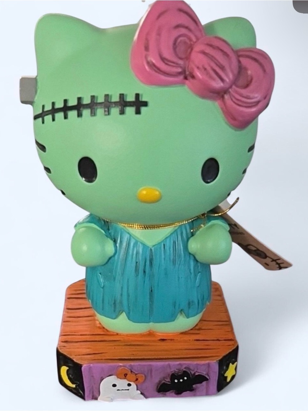 Sanrio Hello Kitty Green Frankenstein with Pink Bow and Teal Dress